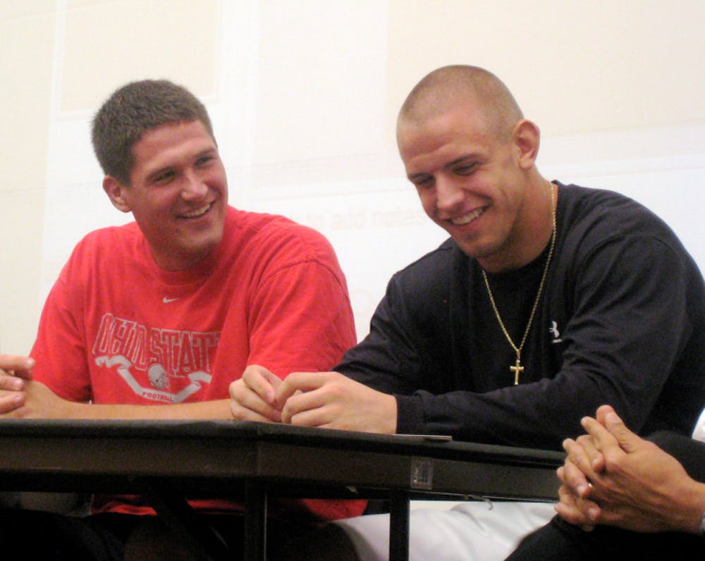 James Laurinaitis (right side) laughs 