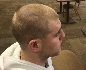 Team Shaves Head for Cancer