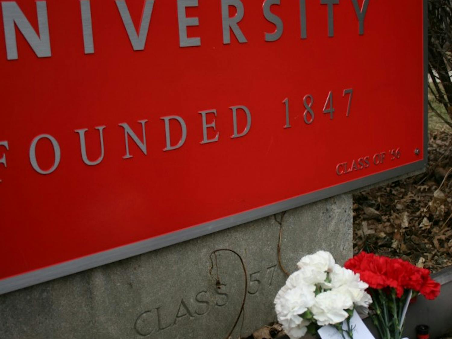 	In memoriam of Kyle Miller: Flowers had been placed by the Otterbein sign on Towers&#8217; lawn. 
