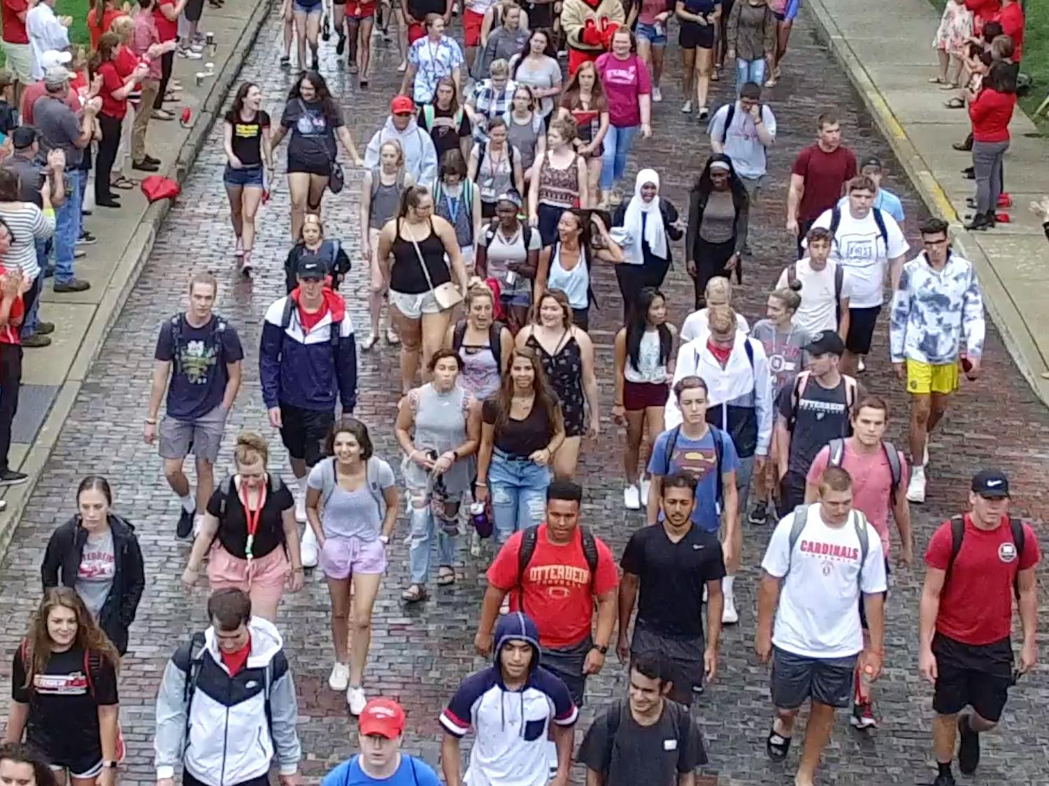 Otterbein freshmen walk to Cowan Hall during First Flight in August, 2018.