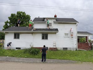 The crew, mostly from Kokomo, Indiana working on the house in downtown Columbus.