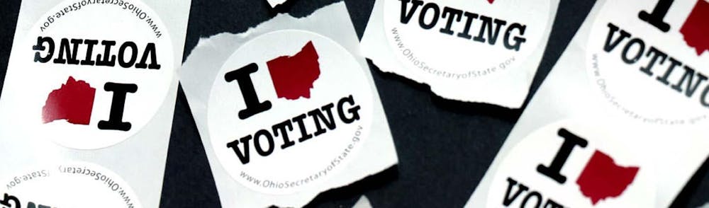 <p>Vote in person and receive one of these stickers.</p>