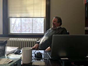 Jefferson Blackburn-Smith at his desk in the admission's office