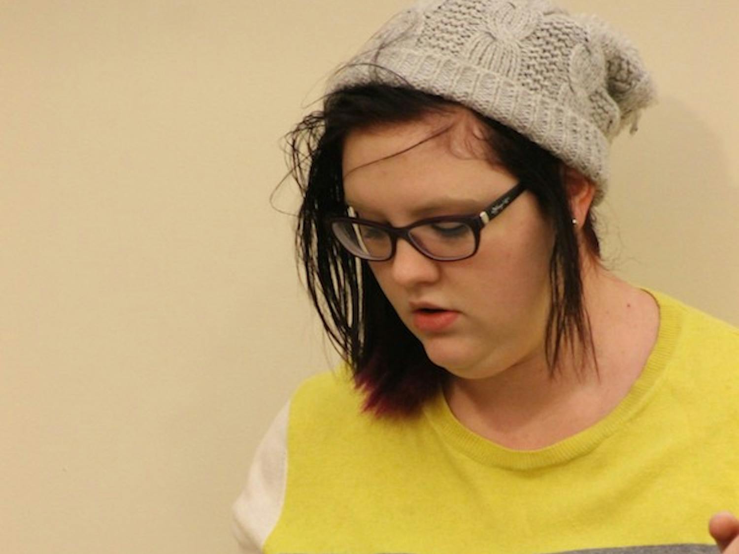 Starving Artists President Addalie Bolyard takes notes at the group's Thursday meeting.