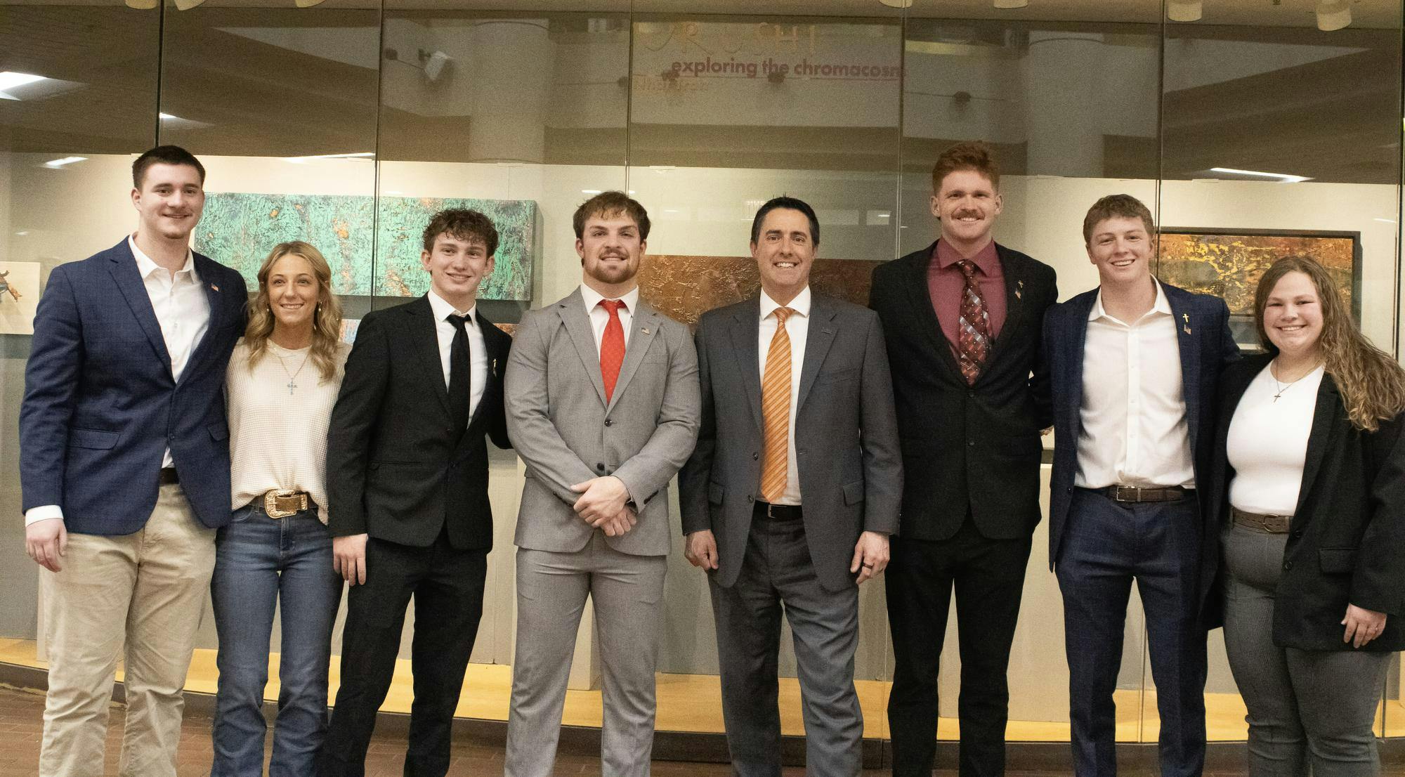 A group of students lined up for a picture with Ohio Secretary of State Frank LaRose.