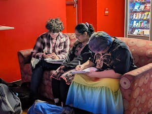 Students studying in commuter lounge