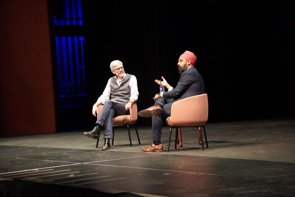 Simran Jeet Singh on stage at Cowan Hall