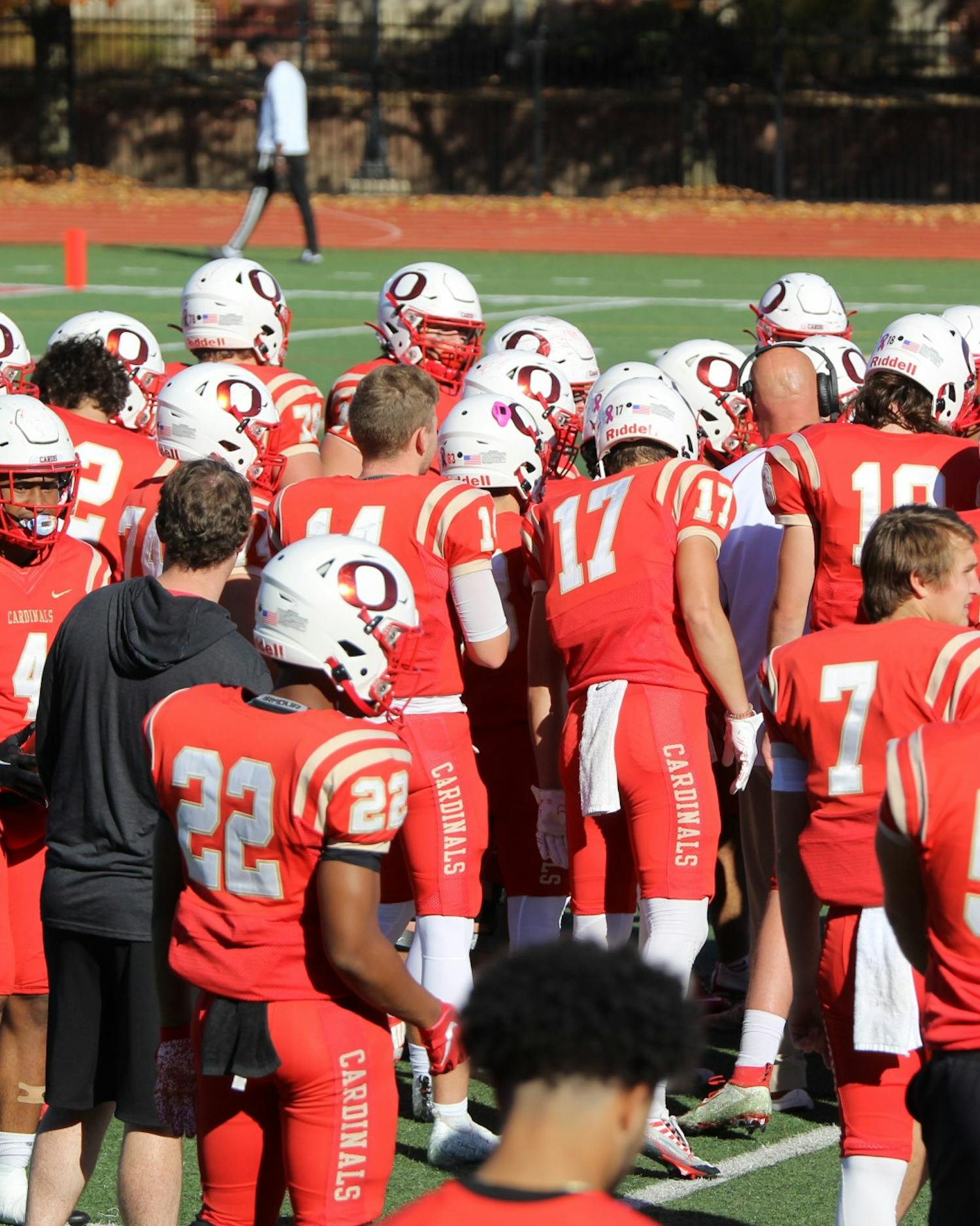 The Otterbein football team huddles up during their Nov. 2 game against Mount Union.