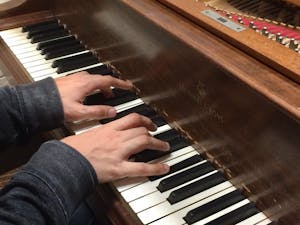 Reid Playing Piano