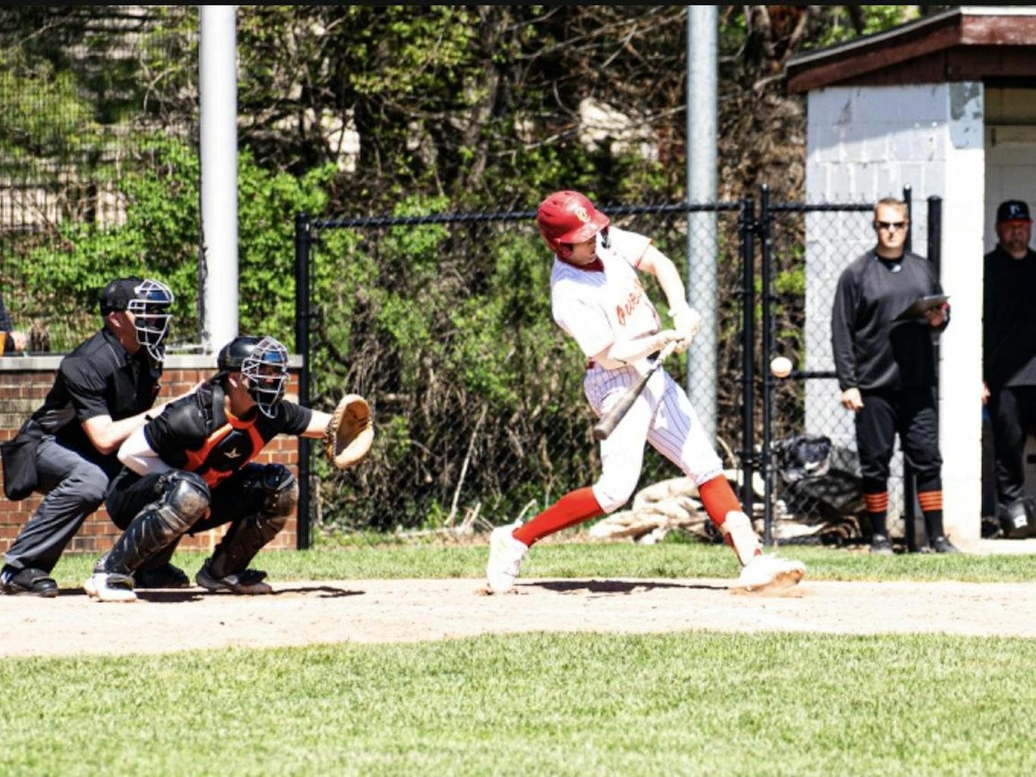 Quincel gets a hit at game against Heidelberg.jpg