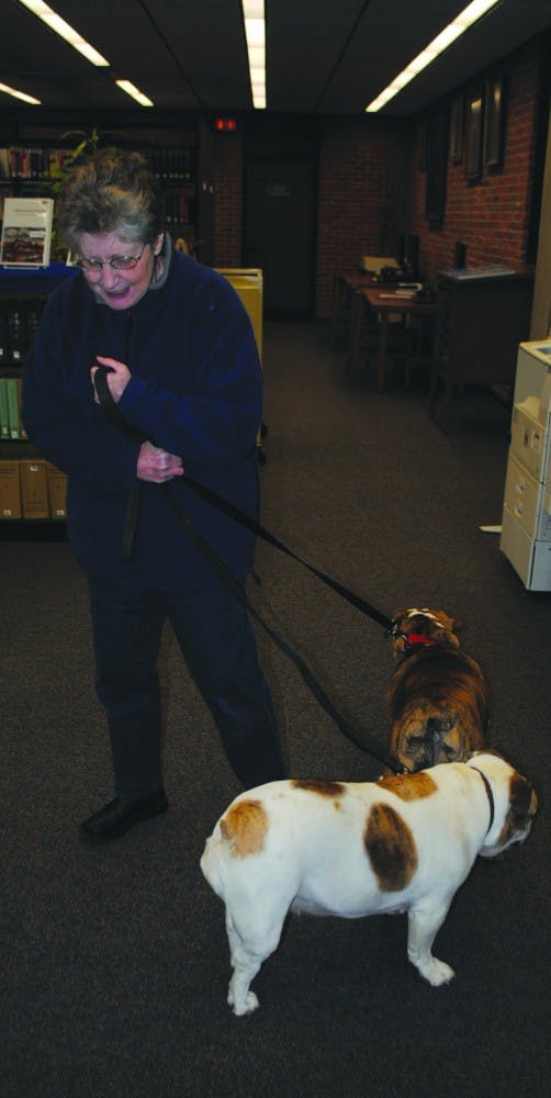 Peg Harmon and her bulldogs make Otterbein home. 