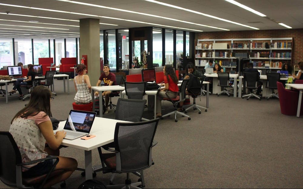 Otterbein students studying at the Courtright Memorial Library