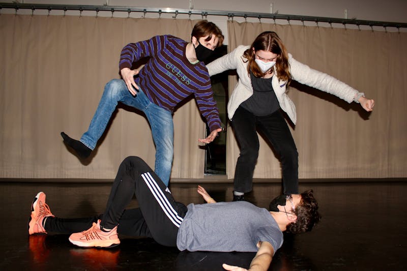 The Otterbein Improv Troupe practices on Feb. 23. Pictured: Luke Maynus (left), Dean Yureka (front), Gracie Guichard (right).