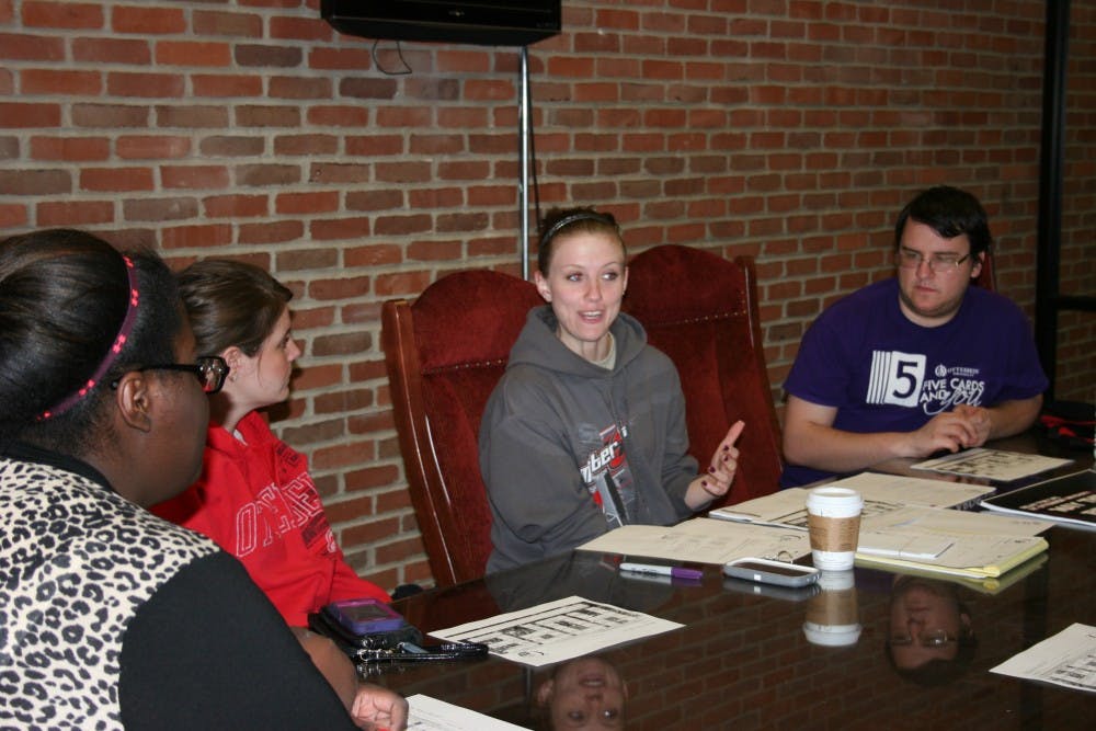 	<p>Teri Seabrook, left, Sara Oravec, Melissa Lucius and Cory Ott discuss publicity at a Relay for Life committee meeting.</p>