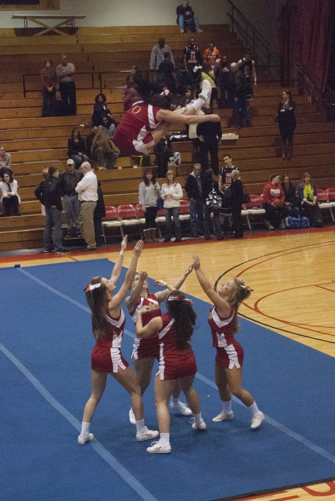 	The cheerleading squad practiced their competition routine after the Ohio Northern game. They will perform this routine at the College U Championships at Battelle Hall on February 9.