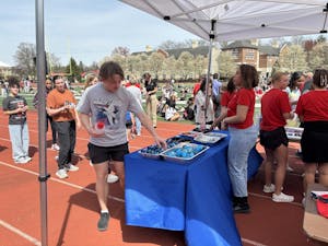 Students Win Prizes at the Eclipse Totality Party after Spinning the “Wheel of Fun”