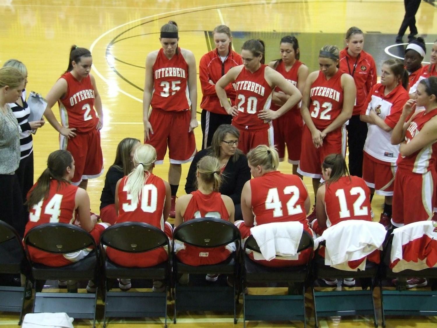 	Coach Richardson discusses strategy with her players during a timeout in the first round of the NCAA Tournament. 