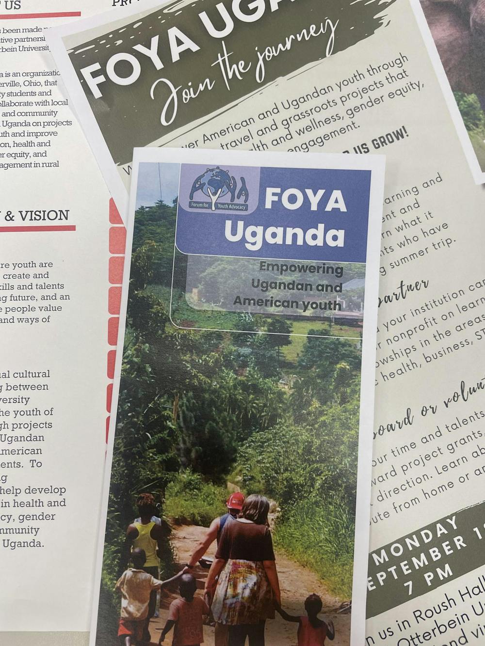 <p>Posters and pamphlets advertising Diane Ross's yearly trip to Uganda.</p>