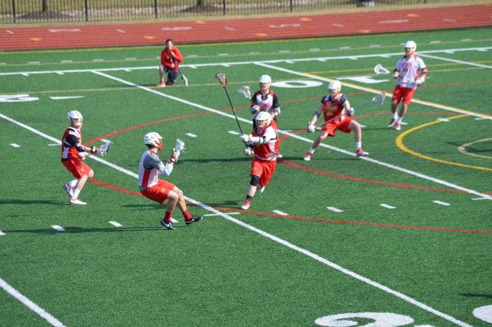 Otterbein lacrosse team practices for their first game of the season.