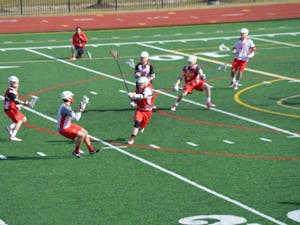 Otterbein lacrosse team practices for their first game of the season.