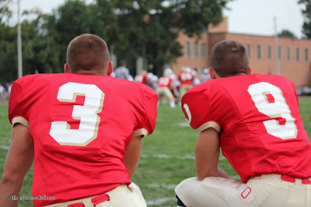 	<p>Seniors Wes McKeever (3) and Ben Sizemore (9) watch their defense attempt to get the ball back into Otterbein hands.</p>