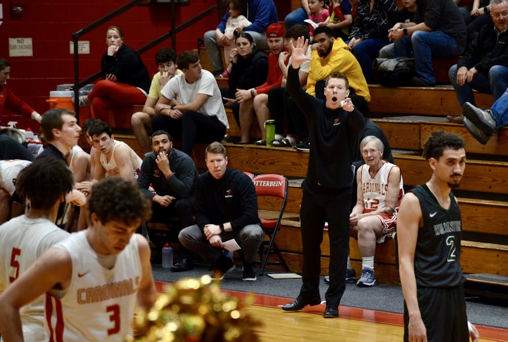 <p>Otterbein's men's basketball coaching staff feeling the pressure during a high-intensity game.</p>