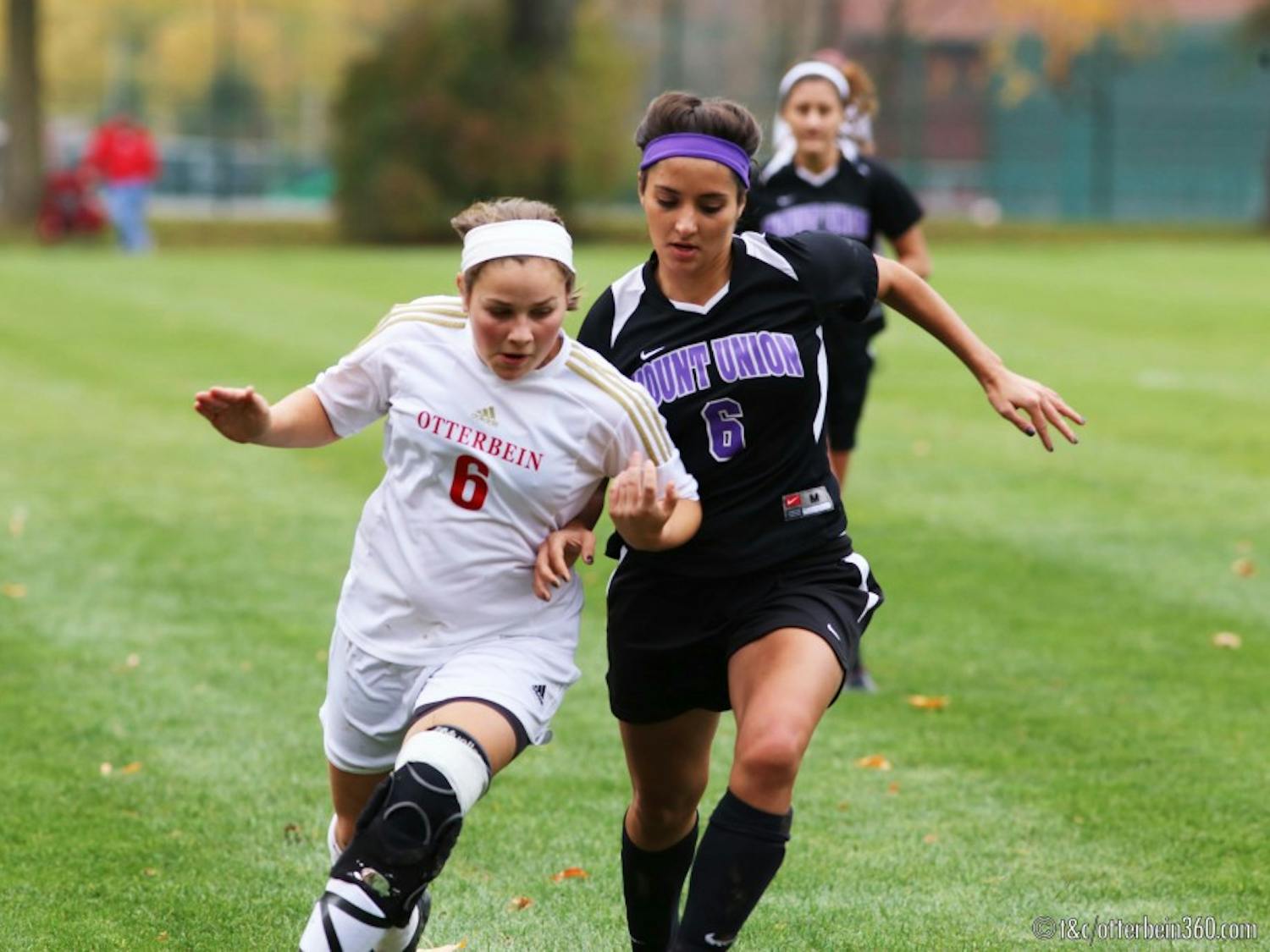 	Freshman forward Polly Sellers pushes past the Mount Union defender in pursuit of the ball. 
