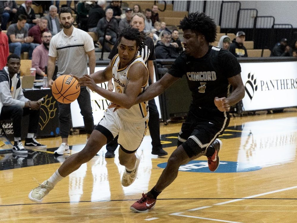 Jarius Jones drives into the lane against a Concord University defender in a game for Ohio Dominican University.