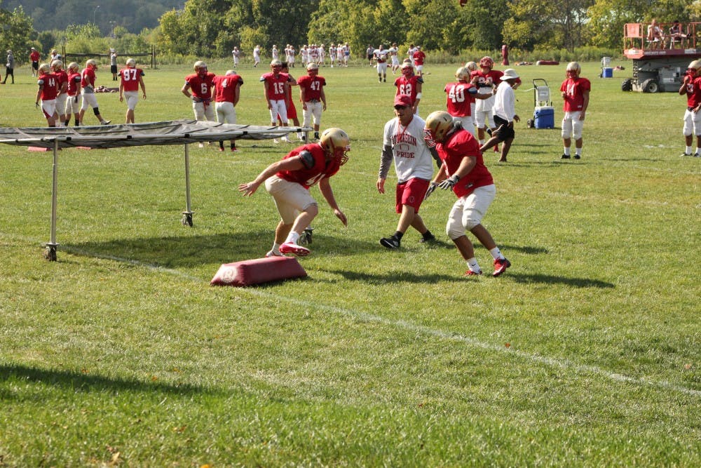 	<p>The football team practices for their first game of the season, which is on Saturday, Sep. 1, 2012 against  Gallaudet University.</p>