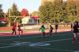 A women's soccer team playing a practice game
