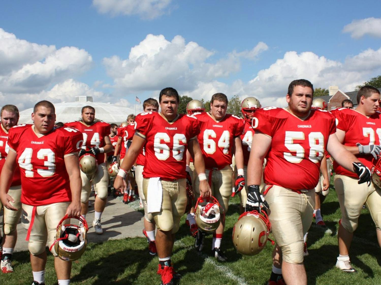 	Otterbein Football players head off for halftime, ready for the win against Wilmington.