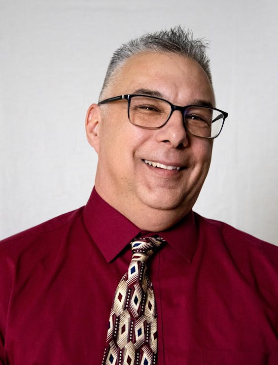 Headshot of student and staff.