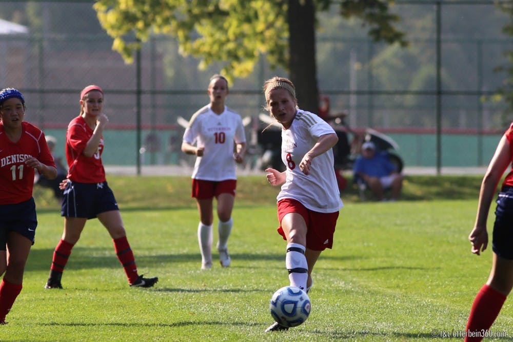 	<p>Senior midfielder Morgan Hendrickson plays a pass down the line in the Oct. 2 game against Denison University. The Cardinals won 2-0.</p>