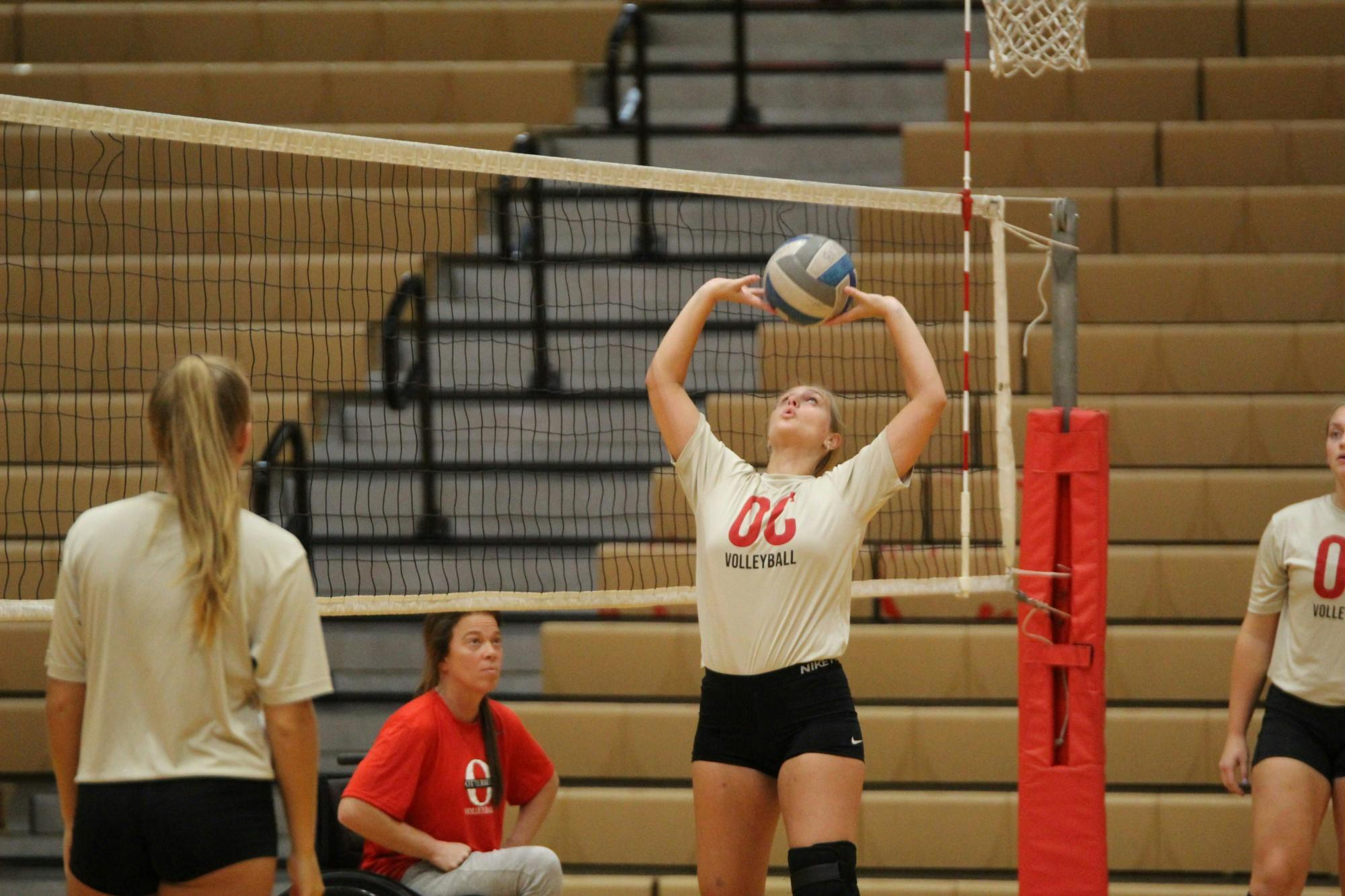 Otterbein volleyball's Kailey Mishler sets the ball during a practice on Aug. 30