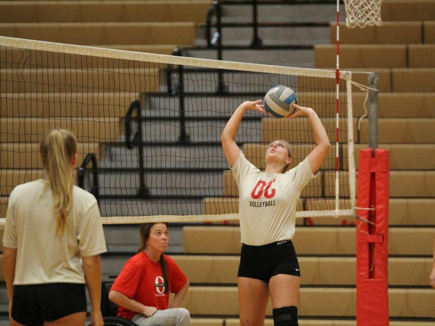 Otterbein volleyball's Kailey Mishler sets the ball during a practice on Aug. 30