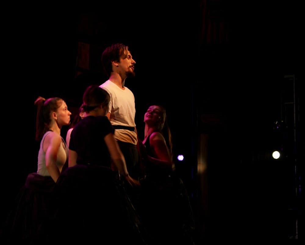 <p>Left to Right: Kailey Souder (BFA Musical Theatre ’25), Shelby Zimmerman (BFA Musical Theatre ’24), Sam Hoyer (BFA Musical Theatre ’23), Kate Maniuszko (BFA Musical Theatre ’23). Lighting by Elliot France.&nbsp;</p>