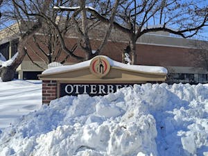 Otterbein sign covered by snow