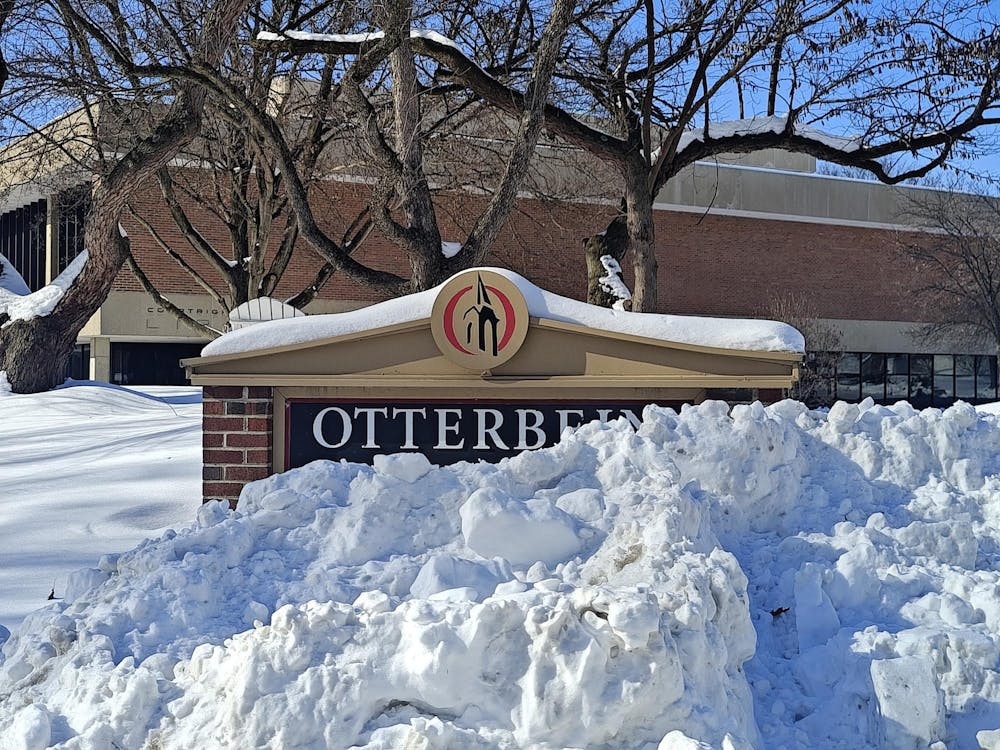 <p>Otterbein sign covered in snow</p>