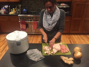 Sarah McPeak cutting chicken