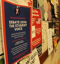 Scattered around campus are posters for student events related to the October Democratic debate at Otterbein.
