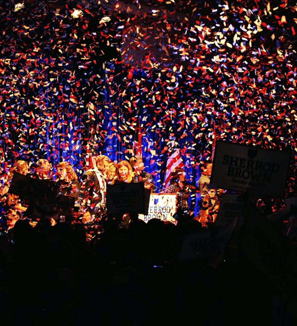 	<p>Confetti erupts at the Hilton hotel in downtown Columbus as Sherrod Brown and his family stand on stage in front of his supporters.</p>