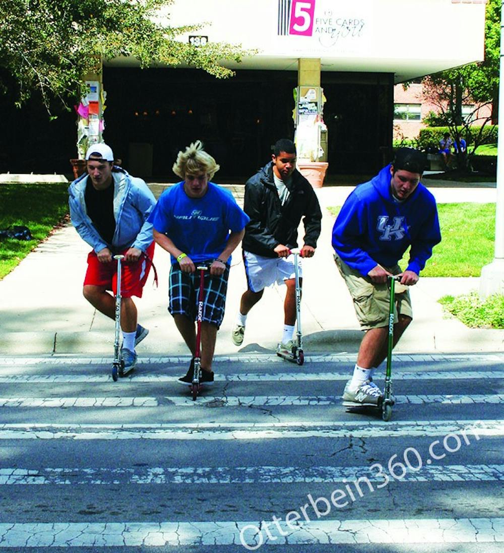 	<p>These four freshmen, along with a handful of others, have created quite the buzz by riding to and from classes on Razor scooters, a method that previously wasn&#8217;t found on Otterbein&#8217;s campus. (From left to right: Robert Simmons, Danny Collins, Marcus Willis, Robbie Guiliano)</p>