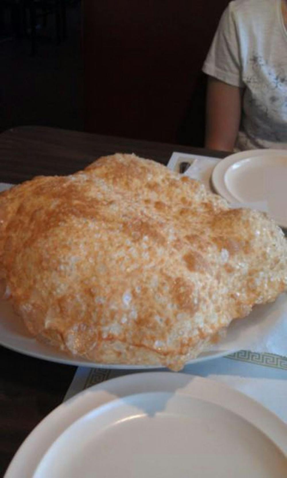 	<p>rise: The Bhatura bread is deep-fried, giving it a crispy and flaky texture. </p>