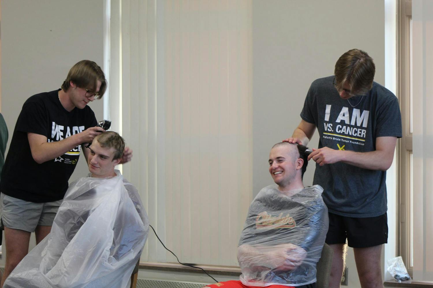 Baseball shaves head in support of cancer research