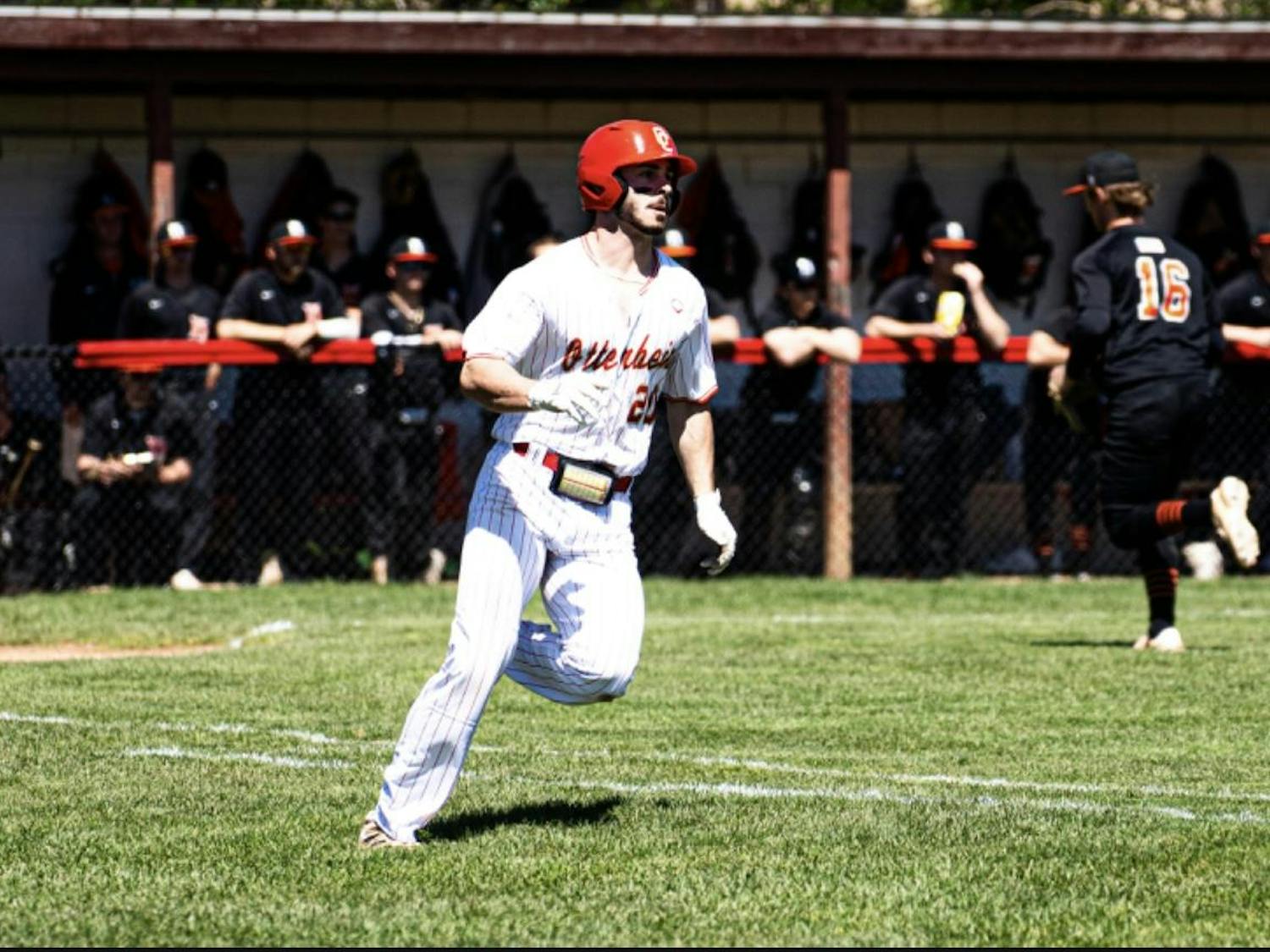 Wolf runs to first base after hit against Heidelberg.jpg