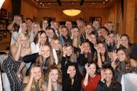 Lefkovitz poses with Sigma Alpha Tau sorority sisters at fall 2018 activiation lunch
