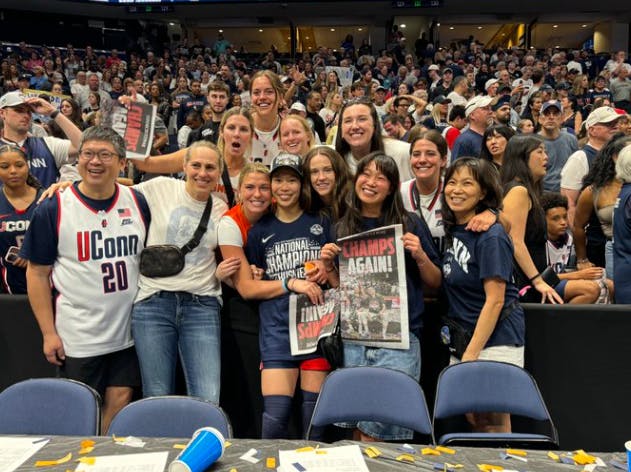 A crowd with Kaitlin Chen ’24 and her friends and family.