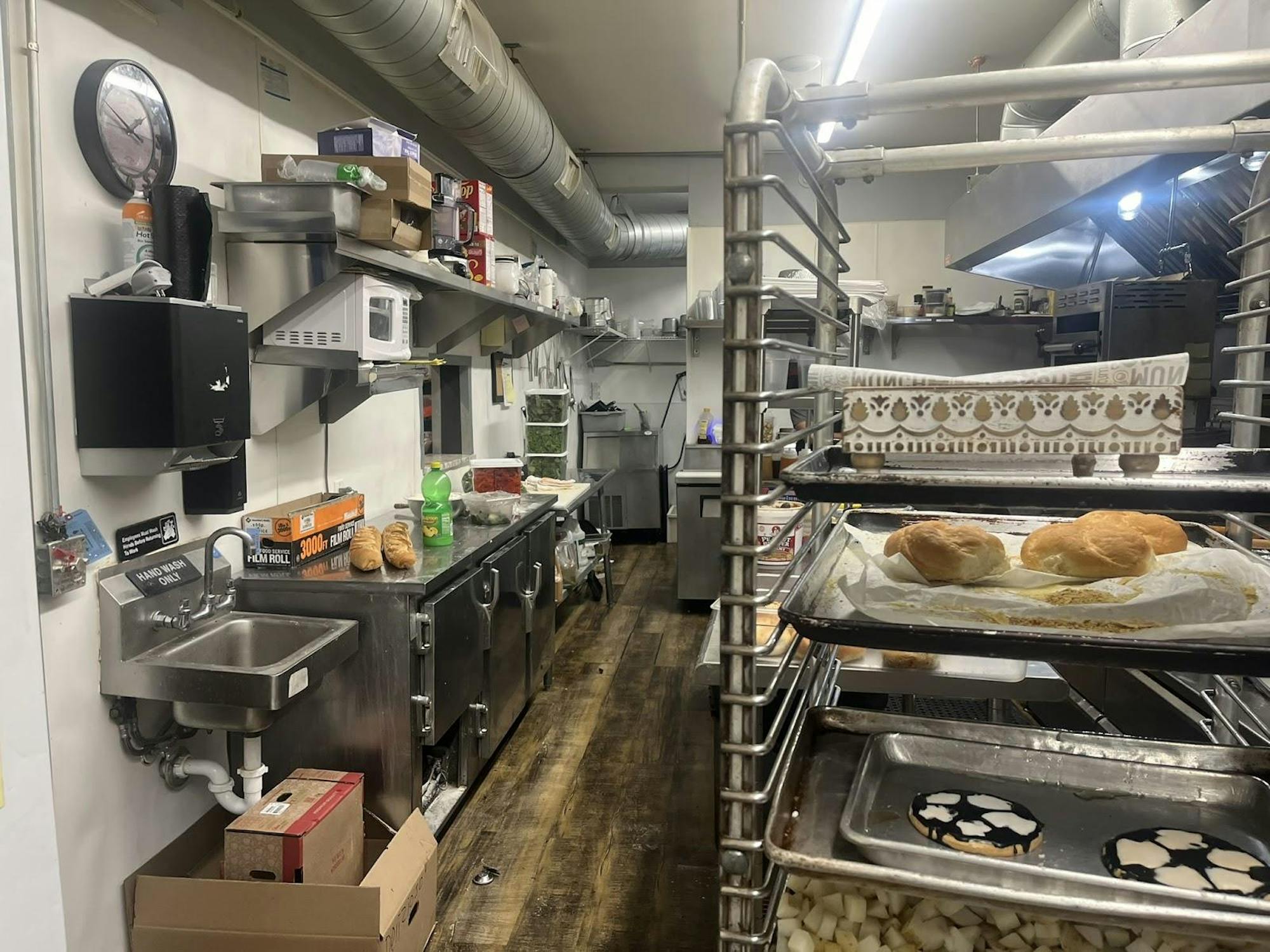 A kitchen environment with bread on the right side.