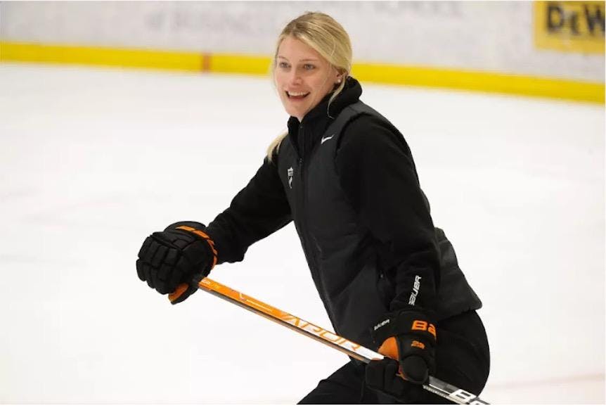 Women skating on ice.
