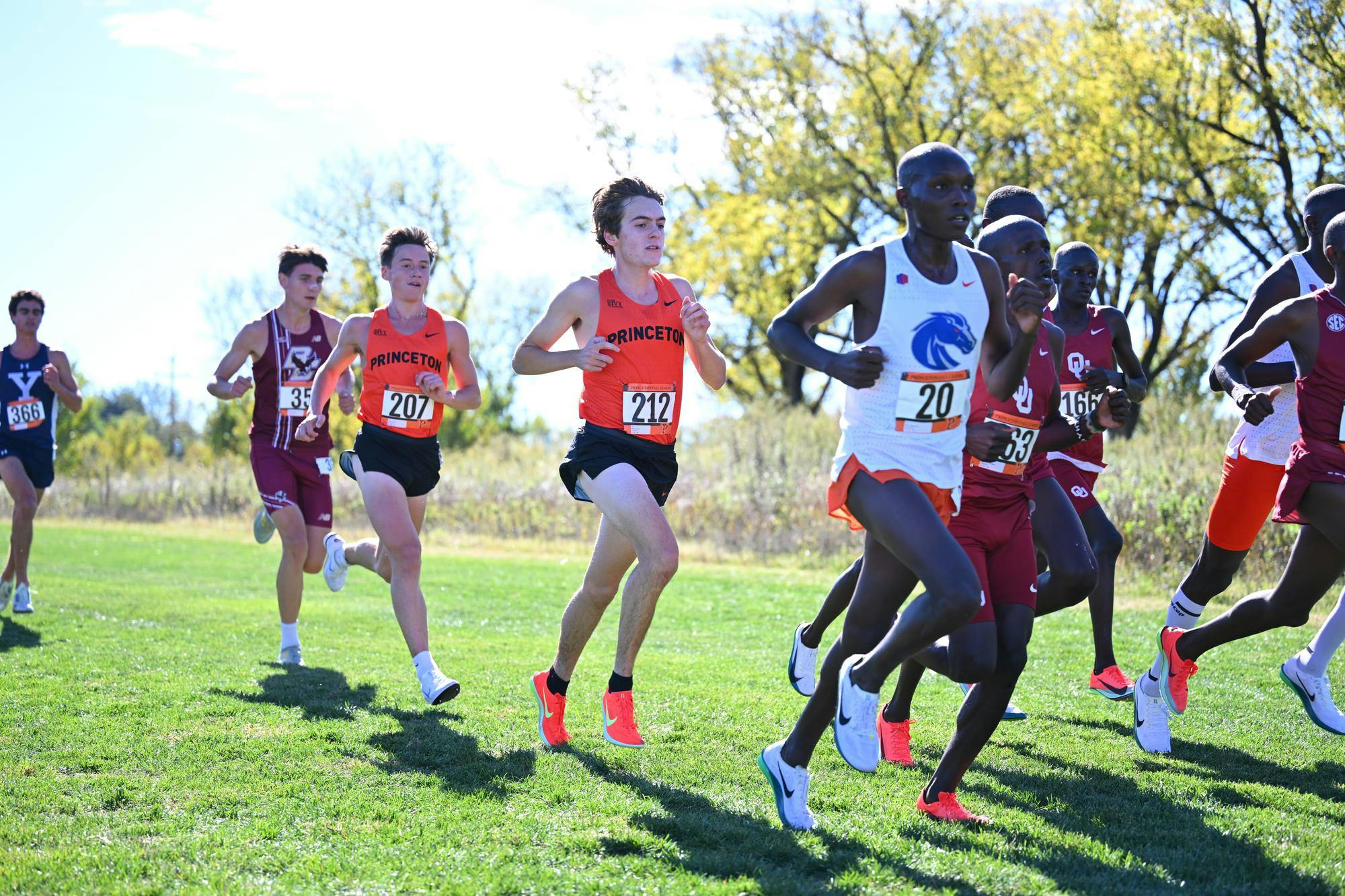 Cross country runners running.